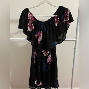 Beautiful black dress with flowers on the dress